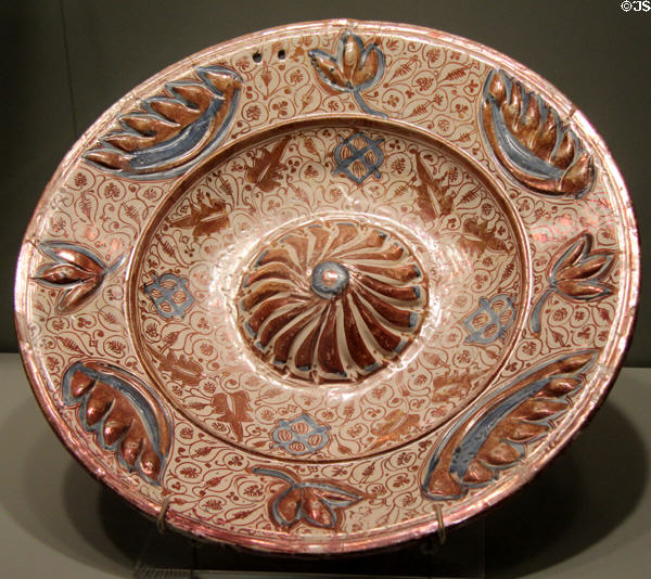 Earthenware dish with luster decoration (16th C) from Valencia, Spain at Gardiner Museum. Toronto, ON.