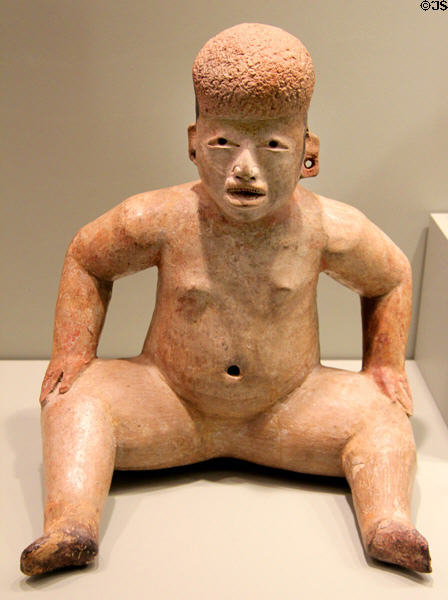 Olmec-culture earthenware seated figure (1100-800 BCE) from Tlapacoya, Mexico at Gardiner Museum. Toronto, ON.