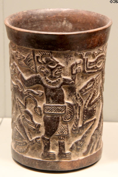 Maya Late Classic earthenware cylinder vessel with carved hunting scene (700-800) from Petén lowlands, Guatemala at Gardiner Museum. Toronto, ON.