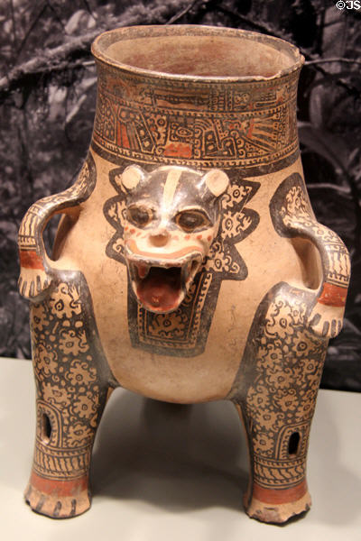 Costa Rica earthenware jaguar effigy tripod vessel with rattle legs (1200-1400) from Nicoya zone at Gardiner Museum. Toronto, ON.