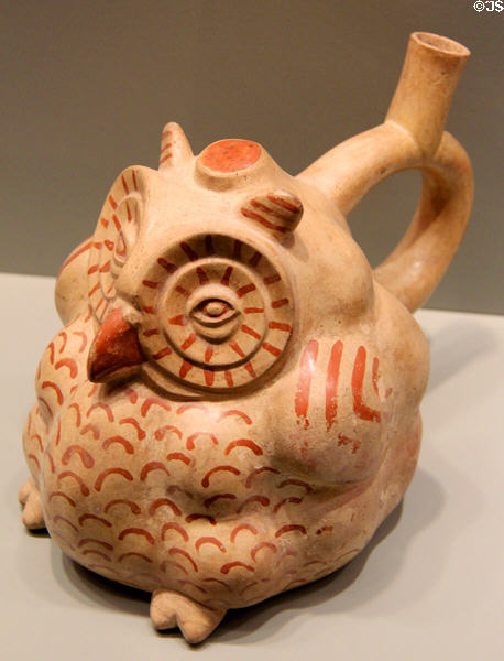 Moche culture earthenware owl effigy bottle with stirrup spout (100-500) from North Coast Peru at Gardiner Museum. Toronto, ON.