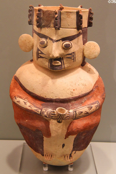 Chancay culture earthenware male figure holding cup (1100-1450) from Central Coast Peru at Gardiner Museum. Toronto, ON.