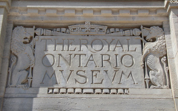 Carved stone sign (1933) on Royal Ontario Museum. Toronto, ON.