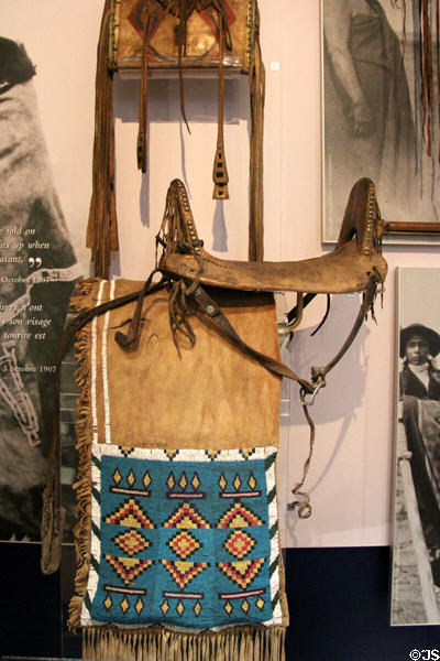 Alberta Blackfoot woman's saddle (c1890) & saddlebag (c1885) at Royal Ontario Museum. Toronto, ON.