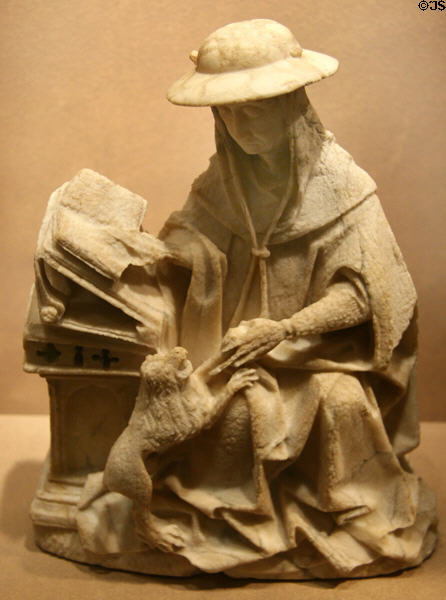 St Jerome with his lion, bishop's hat & book symbols sculpture (mid or late 1400s) from Rhine River Germany region at Royal Ontario Museum. Toronto, ON.