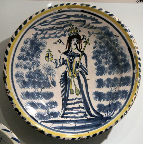 Tin-glazed earthenware charger showing Queen Anne (c1705) probably from Bristol, England at Royal Ontario Museum. Toronto, ON.