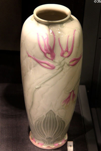 Porcelain vase with pink flowers (1900-1) by Edward Colonna made by Gérard Duraisseix & Abbot of Limoges, France at Royal Ontario Museum. Toronto, ON.