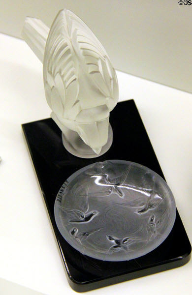 Glass ashtray with figure of bird (1920-30) by Lalique (?) of France at Royal Ontario Museum. Toronto, ON.