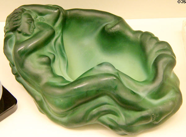 Molded woman green glass ashtray (1935-40) from Czechoslovakia at Royal Ontario Museum. Toronto, ON.