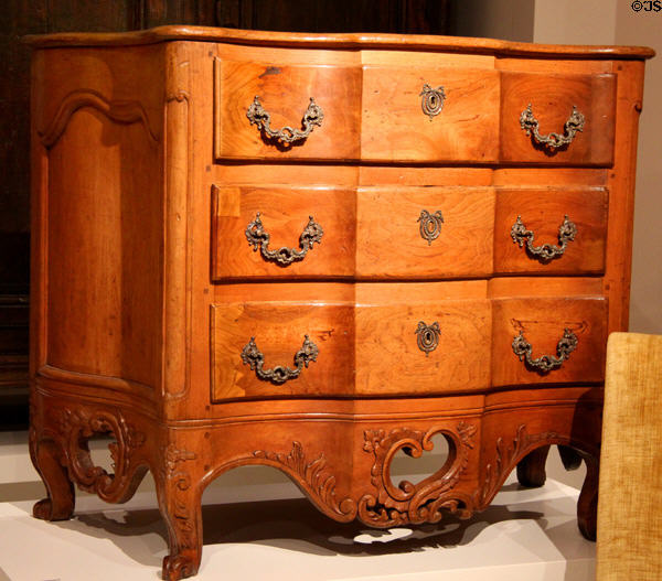 Rococo butternut chest of drawers (1750-1810) from Montreal area at Royal Ontario Museum. Toronto, ON.