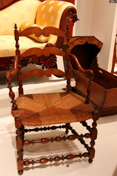 Capuchin-style armchair with caned seat (c1775-1800) probably from Montreal area at Royal Ontario Museum. Toronto, ON.