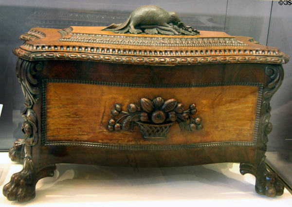 Carved wooden cellaret topped by beaver (c1880s) probably from Montreal at Royal Ontario Museum. Toronto, ON.