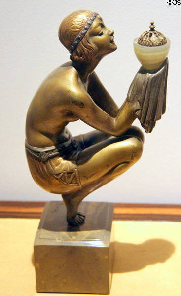 Art Deco polychromed bronze sculpture with woman holding vessel (1920s) by D.H. Chiparus of France at Royal Ontario Museum. Toronto, ON.