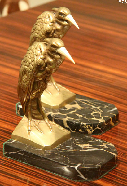 Art Deco brass, marble & ivory bookends with waterbirds (1920s) from Manin, France at Royal Ontario Museum. Toronto, ON.