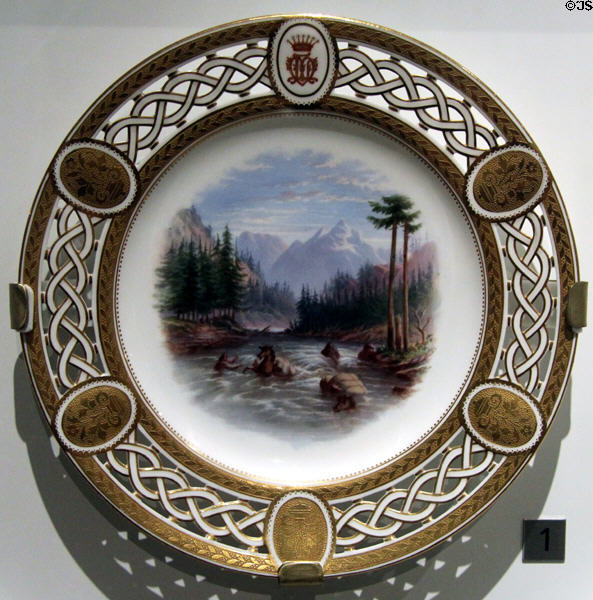 Porcelain plate with print of Assiniboine Rescues Bucephalus (c1867) by Minton of Longton, Staffordshire, England part of Lord Milton dessert service at Royal Ontario Museum. Toronto, ON.