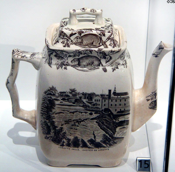 Earthenware teapot with transfer-print of Lorette Falls, Quebec (1880s) by Britannia Pottery of Glasgow, Scotland at Royal Ontario Museum. Toronto, ON.