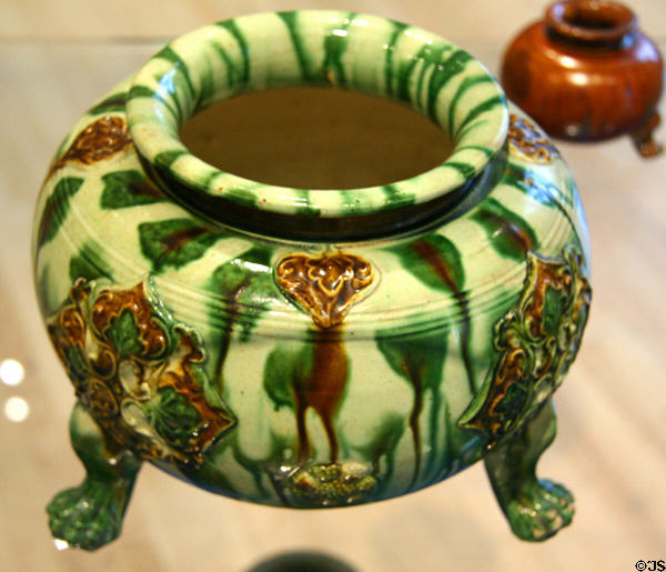 Glazed earthenware tripod (675-750 - Tang dynasty) at Royal Ontario Museum. Toronto, ON.