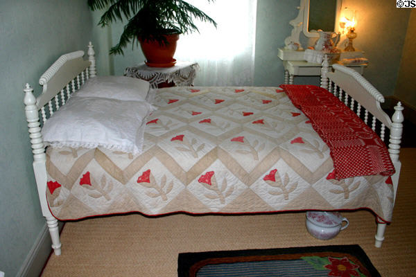 Turned bed with quilt in bedroom of Green Gables. Cavendish, PE.