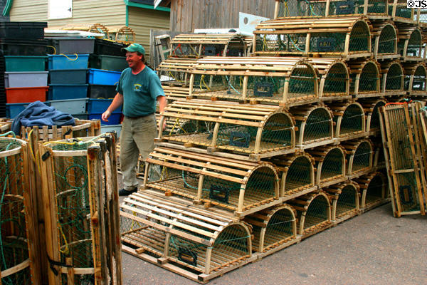 Stacking lobster traps in New London. PE.