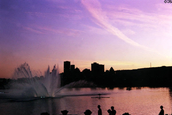 Sunset skyline of Montreal over fountain at Expo 67. Montreal, QC.