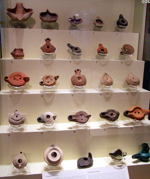 Collection of Mediterranean earthenware oil lamps (Roman era) at Montreal Museum of Fine Arts. Montreal, QC.