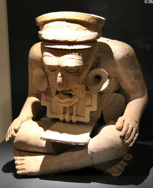 Terracotta seated old man (600-900) from Veracruz, Mexico at Montreal Museum of Fine Arts. Montreal, QC.