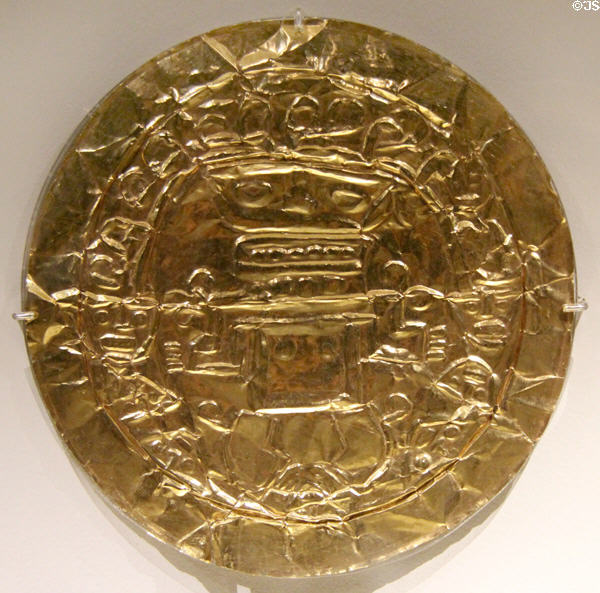 Gold disk with masks in relief (500-1550) from Central America at Montreal Museum of Fine Arts. Montreal, QC.