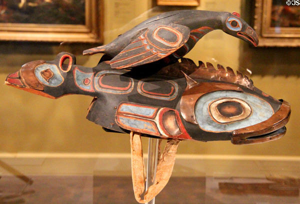 Kaigani Haida or Tlingit crest dance helmet with raven on fish (late 19thC) from Alaska at Montreal Museum of Fine Arts. Montreal, QC.