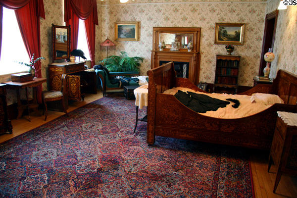 First guest bedroom with inlaid furniture at Saskatchewan Government House. Regina, SK.