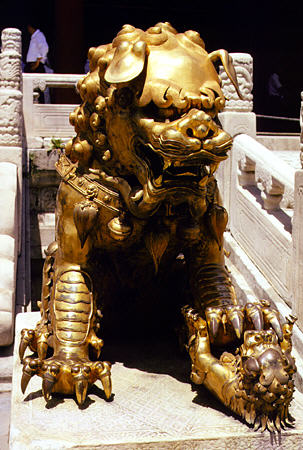Gold lion from Beijing's Forbidden City. China.