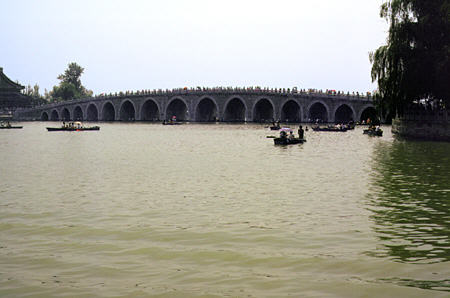 Bridge with 17 arches crosses Kunming lake to South Lake Island in Beijing's Summer Palace. China.