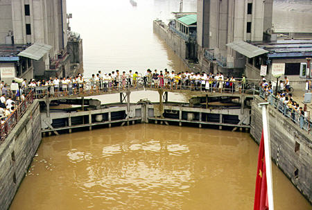 Crowds gather on Yichang dam on Yangtze River. China.