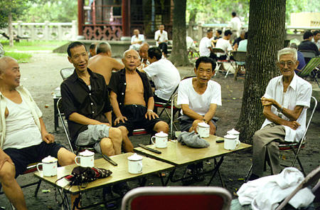 Group of men enjoy tea in a Wuhan park. China.