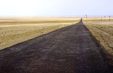 Road between Urumqi (Urumchi) and Turpan in Gebi desert. China.