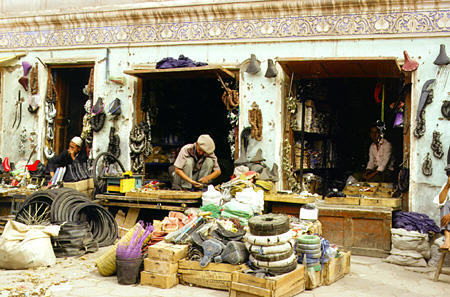 Hardware merchant with variety of goods for sale in Kashgar. China.