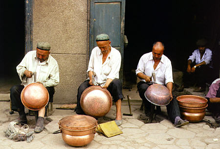 Copper bowl makers in Kashgar. China.
