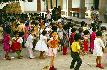 Children play outside at the school for minorities, Kashgar. China.