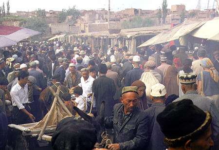 Crowds at the busy Sunday market in Kashgar. China.