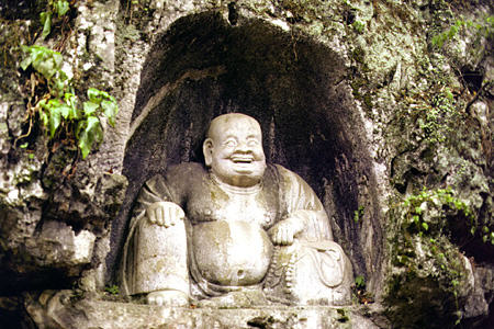 Laughing Buddha statue in the Hangzhou Temple. China.