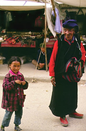 Old woman and young girl in Lhasa, Tibet. China.