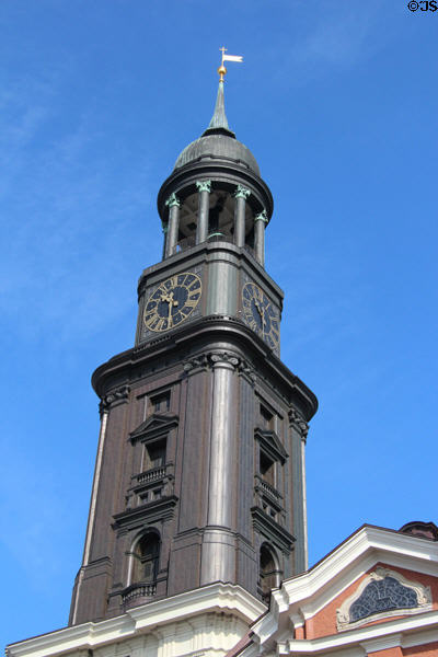 St Michael's Church copper clad spire, cupola & one of four large clock faces. Hamburg, Germany.