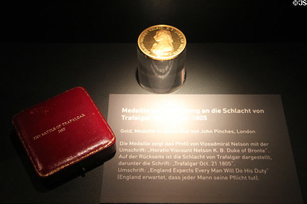 Gold coin inscribed with image of Horatio Nelson & leather case inscribed " Battle of Trafalgar 1805" at International Maritime Museum. Hamburg, Germany.