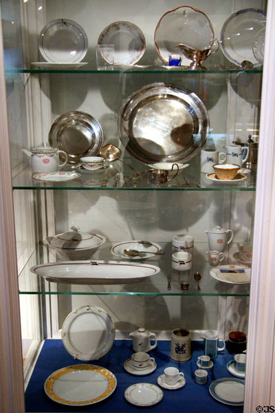 Collection of modern passenger ship table service porcelain & silver at International Maritime Museum. Hamburg, Germany.