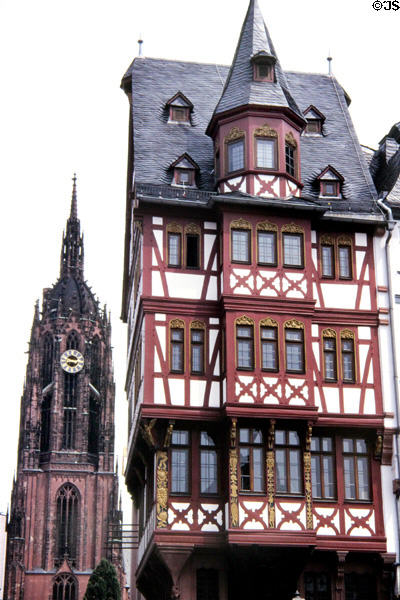 Cathedral spire & Grosser Engel house (14thC, destroyed in WW II, reconstructed 1980's) in Römer area. Frankfurt am Main, Germany.