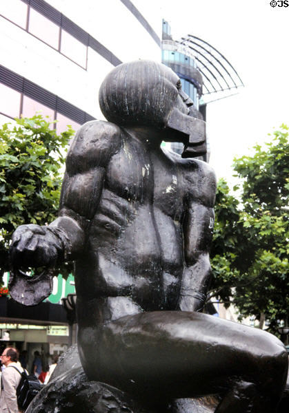 David & Goliath statue (1983) by Richard Hess at entrance to Zeil Promenade. Frankfurt am Main, Germany.