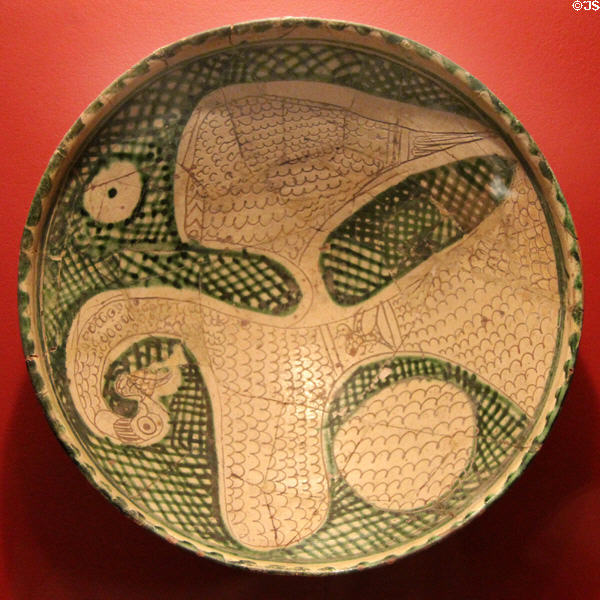 Earthenware bowl with bird design (11thC or 12thC) from Iran at Five Continents Museum. Munich, Germany.