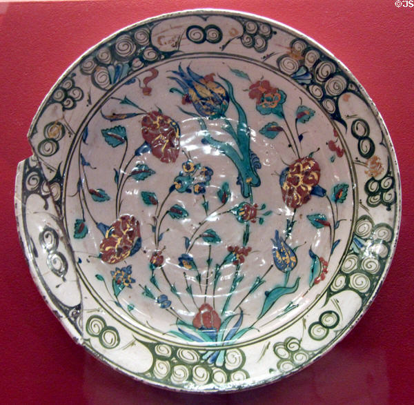 Ceramic plate painted with flowers (17thC) from Iznik, Turkey at Five Continents Museum. Munich, Germany.