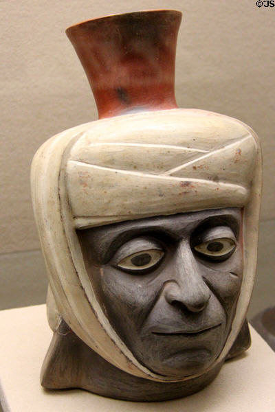 Moche culture ceramic vessel in shape of portrait heads (100 BCE- 600 CE) from north coast of Peru at Five Continents Museum. Munich, Germany.