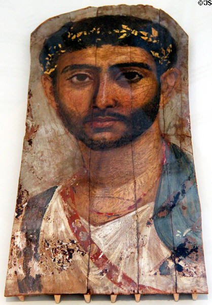 Mummy portrait of young soldier with sword belt from Fayum, Egypt (100-150 CE) at Altes Museum. Berlin, Germany.