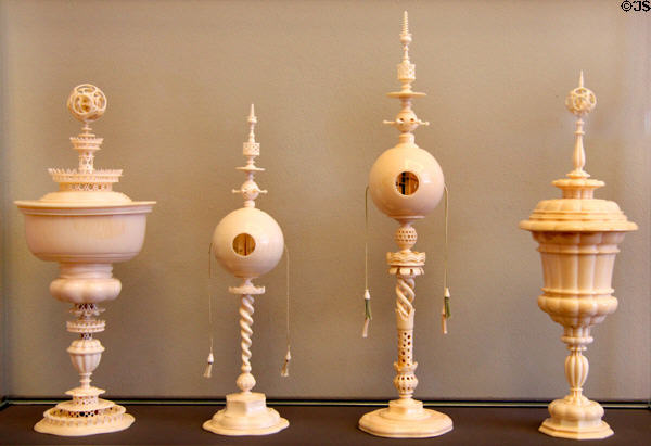 Carved ivory covered cups & hollow spheres (early 17thC) from Germany at Bode Museum. Berlin, Germany.